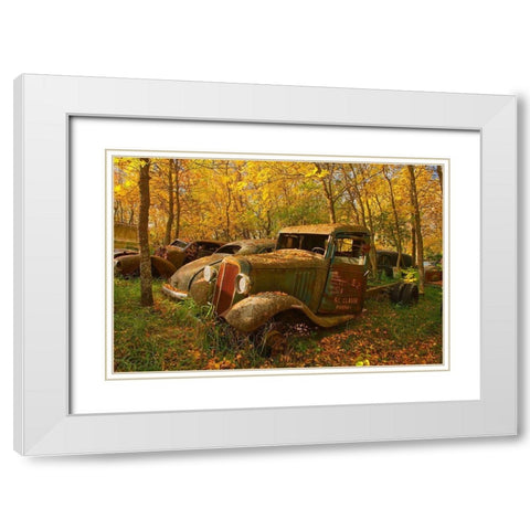Canada-Manitoba-St Lupicin Vintage old vehicles in wrecking yard White Modern Wood Framed Art Print with Double Matting by Jaynes Gallery
