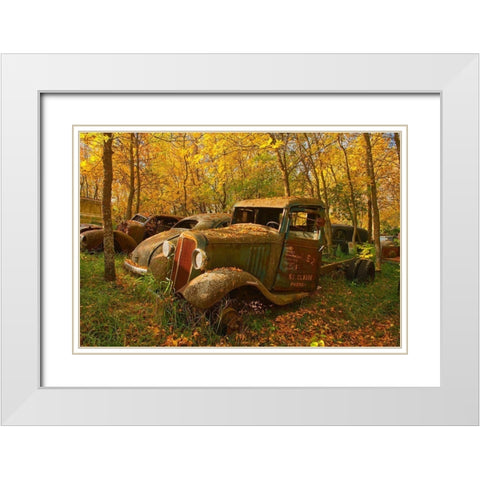 Canada-Manitoba-St Lupicin Vintage old vehicles in wrecking yard White Modern Wood Framed Art Print with Double Matting by Jaynes Gallery