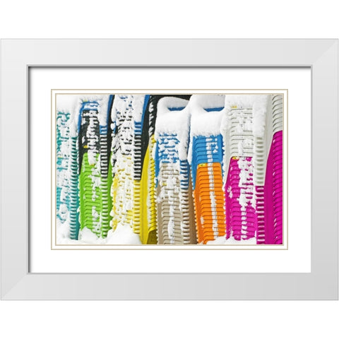 Canada, Dorset Snow-covered stacked chairs White Modern Wood Framed Art Print with Double Matting by Grandmaison, Mike