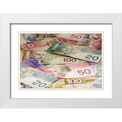 Close-up of assorted Canadian paper currency White Modern Wood Framed Art Print with Double Matting by Flaherty, Dennis