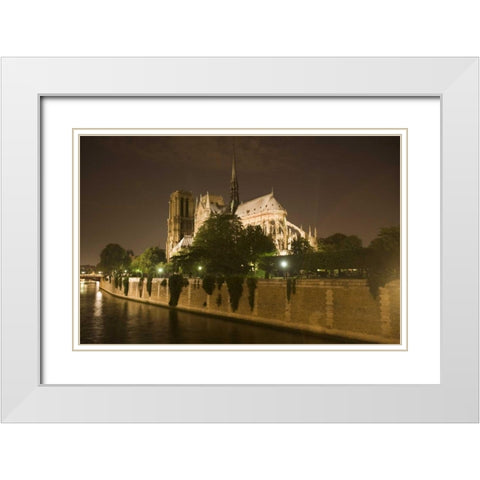 France, Paris Notre Dame Cathedral lit at night White Modern Wood Framed Art Print with Double Matting by Zuckerman, Jim