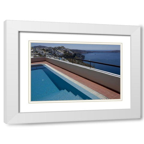 Greece, Santorini Swimming pool overlooking town White Modern Wood Framed Art Print with Double Matting by Young, Bill