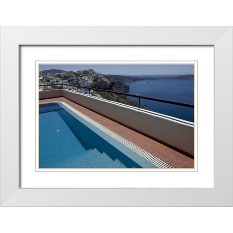 Greece, Santorini Swimming pool overlooking town White Modern Wood Framed Art Print with Double Matting by Young, Bill