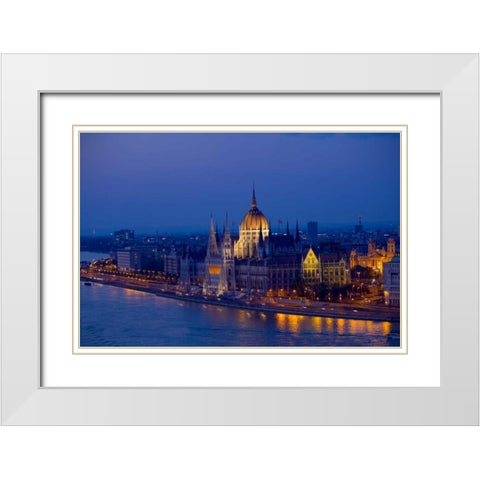 Hungary, Budapest Parliament Building and city White Modern Wood Framed Art Print with Double Matting by Zuckerman, Jim