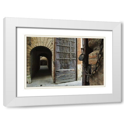Italy, Tuscany, Fortified gate and an alley White Modern Wood Framed Art Print with Double Matting by Flaherty, Dennis
