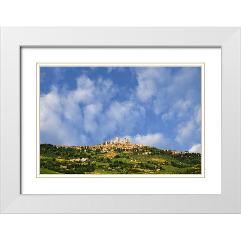 Italy, Tuscany Vineyards around hilltop town White Modern Wood Framed Art Print with Double Matting by Flaherty, Dennis