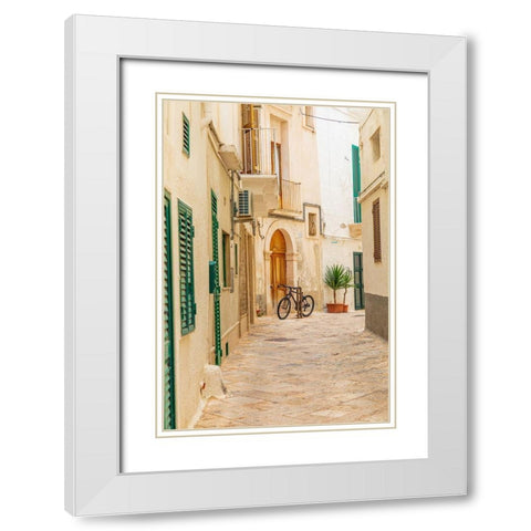 Italy-Apulia-Metropolitan City of Bari-Monopoli Narrow street between buildings-with a bicycle White Modern Wood Framed Art Print with Double Matting by Wilson, Emily