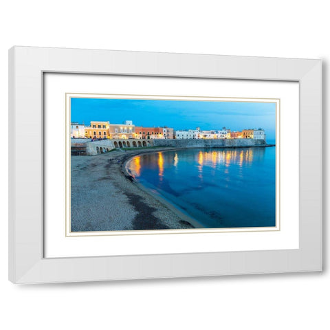 Italy-Apulia-Province of Lecce-Gallipoli Beach and old town section over the Ionian Sea at dusk White Modern Wood Framed Art Print with Double Matting by Wilson, Emily