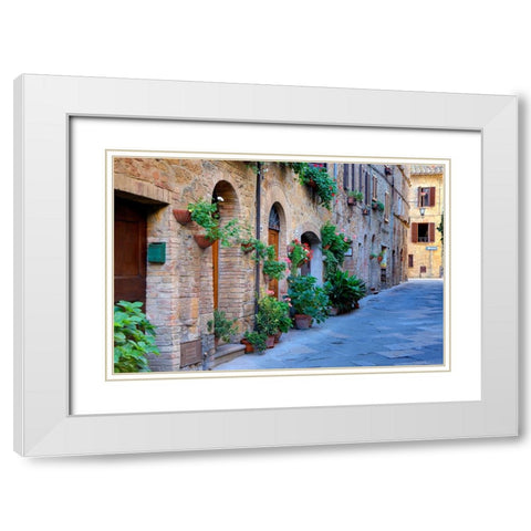 Italy-Tuscany-Pienza Flower pots and potted plants decorate a narrow street in a Tuscany village White Modern Wood Framed Art Print with Double Matting by Eggers, Julie
