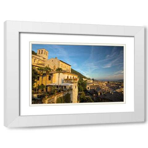 Italy- Umbria. Evening light on flower covered buildings overlooking the medieval town of Gubbio. White Modern Wood Framed Art Print with Double Matting by Eggers, Julie
