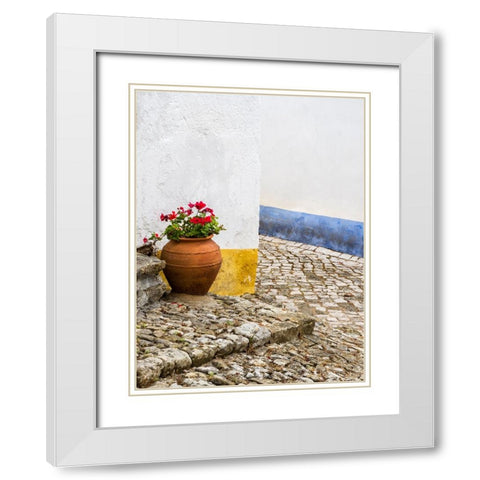 Portugal-Obidos-Red geranium growing in a terra cotta pot next to the entrance of a home in the his White Modern Wood Framed Art Print with Double Matting by Eggers, Julie