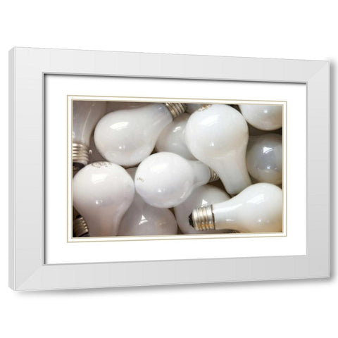 Montage close-up of incandescent light bulbs White Modern Wood Framed Art Print with Double Matting by Paulson, Don