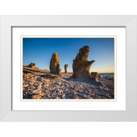 Sweden-Faro Island-Langhammars Area-Langhammar coastal limestone rauk rock-sunset White Modern Wood Framed Art Print with Double Matting by Bibikow, Walter
