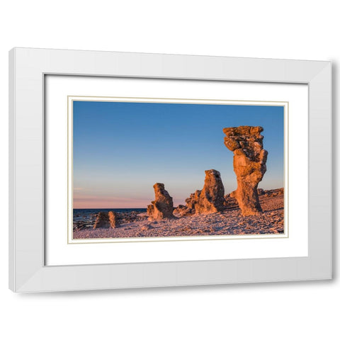 Sweden-Faro Island-Langhammars Area-Langhammar coastal limestone rauk rock-sunset White Modern Wood Framed Art Print with Double Matting by Bibikow, Walter