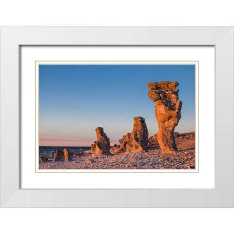 Sweden-Faro Island-Langhammars Area-Langhammar coastal limestone rauk rock-sunset White Modern Wood Framed Art Print with Double Matting by Bibikow, Walter