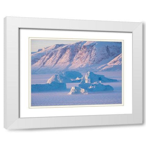 Icebergs frozen into the sea ice of the Uummannaq Fjord System during winter  White Modern Wood Framed Art Print with Double Matting by Zwick, Martin