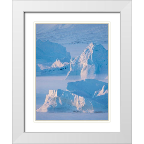 Icebergs frozen into the sea ice of the Uummannaq Fjord System during winter  White Modern Wood Framed Art Print with Double Matting by Zwick, Martin