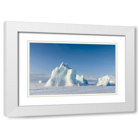 Icebergs frozen into the sea ice of the Uummannaq Fjord System during winter  White Modern Wood Framed Art Print with Double Matting by Zwick, Martin