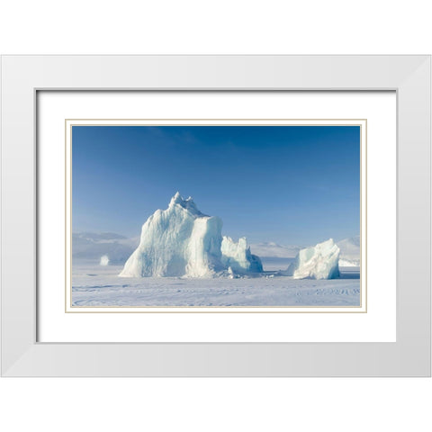 Icebergs frozen into the sea ice of the Uummannaq Fjord System during winter  White Modern Wood Framed Art Print with Double Matting by Zwick, Martin