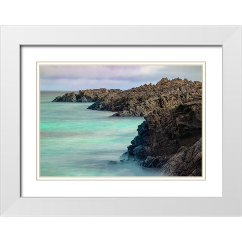 Lava rocks along tranquil shoreline of San Cristobal Island-Galapagos-Ecuador White Modern Wood Framed Art Print with Double Matting by Jones, Adam
