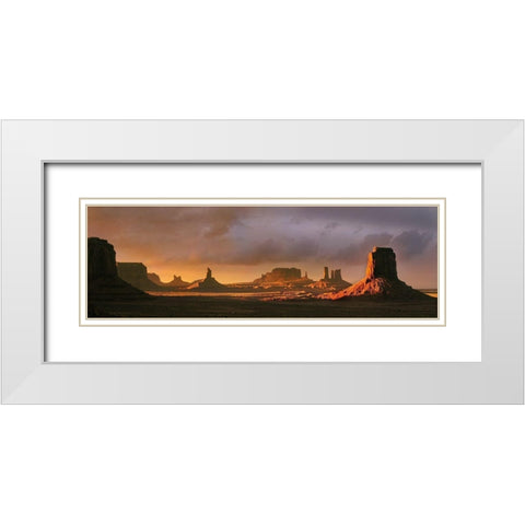 Last light bathes Monument Valley in deep oranges and lavenders on the Arizona-Utah border White Modern Wood Framed Art Print with Double Matting by SMO