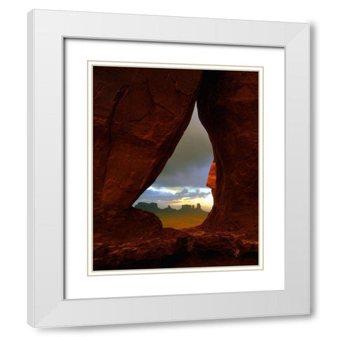 Teardrop arch frames the Monument Valley rock formations on the Utah-Arizona border White Modern Wood Framed Art Print with Double Matting by SMO