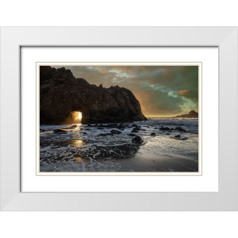 Sunset shines through a tunnel in this sea rock at Big Sur. White Modern Wood Framed Art Print with Double Matting by Sederquist, Betty