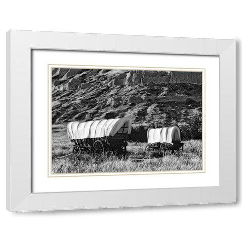 Nebraska, Scotts Bluff Covered wagons in field White Modern Wood Framed Art Print with Double Matting by Flaherty, Dennis