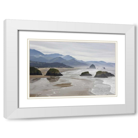 Oregon, Cannon Beach Fog rises over coastline White Modern Wood Framed Art Print with Double Matting by Carter, Jean