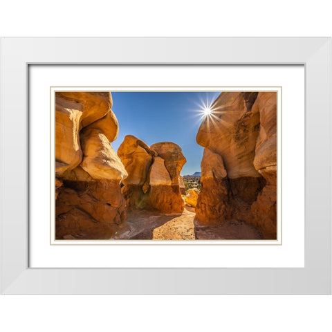 USA- Utah- Devils Garden Outstanding Natural Area. Sun starburst on hoodoo rock formations. White Modern Wood Framed Art Print with Double Matting by Jaynes Gallery