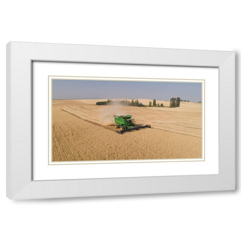 Aerial view of a John Deere combine cutting wheat on a sunny afternoon-Spokane County White Modern Wood Framed Art Print with Double Matting by Probst, Greg