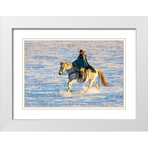 USA- Shell- Wyoming. Hideout Ranch cowgirl riding her horse in the snow.  White Modern Wood Framed Art Print with Double Matting by Gulin, Darrell