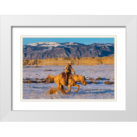 USA- Shell- Wyoming. Hideout Ranch cowgirl riding fast snows.  White Modern Wood Framed Art Print with Double Matting by Gulin, Darrell