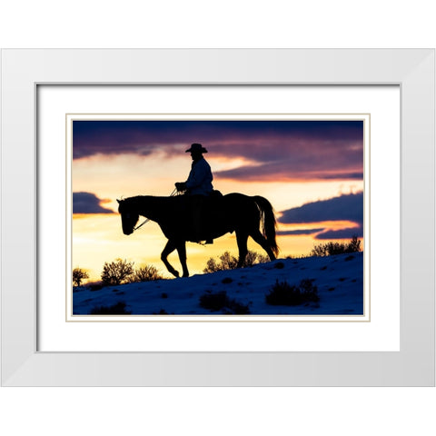 USA- Shell- Wyoming. Hideout Ranch cowboy on horseback silhouetted at sunset.  White Modern Wood Framed Art Print with Double Matting by Gulin, Darrell