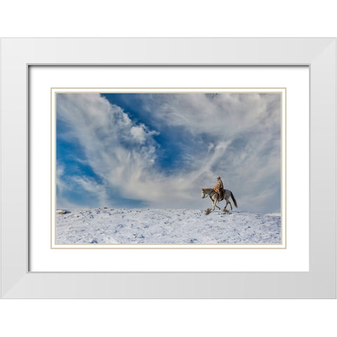USA- Shell- Wyoming. Hideout Ranch cowgirl on horseback riding on ridgeline snow.  White Modern Wood Framed Art Print with Double Matting by Gulin, Darrell