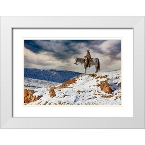 USA- Shell- Wyoming. Hideout Ranch cowgirl on horseback riding on ridgeline snow.  White Modern Wood Framed Art Print with Double Matting by Gulin, Darrell