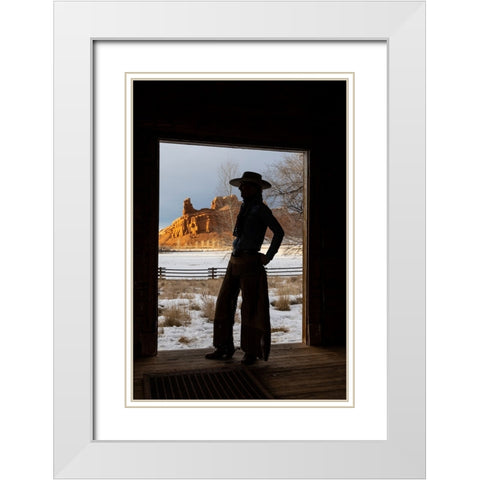 USA- Shell- Wyoming. Hideout Ranch with cowgirl silhouetted in doorway of log cabin.  White Modern Wood Framed Art Print with Double Matting by Gulin, Darrell