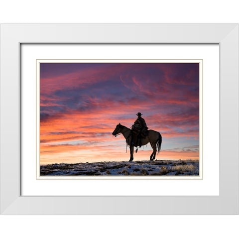 USA- Shell- Wyoming. Hideout Ranch cowgirl silhouetted on horseback at sunset.  White Modern Wood Framed Art Print with Double Matting by Gulin, Darrell