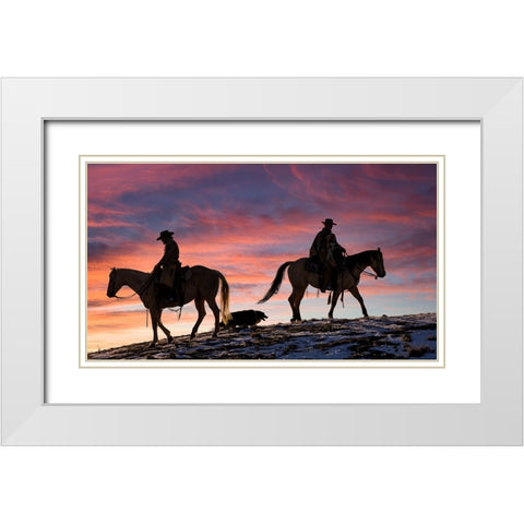 USA- Shell- Wyoming. Hideout Ranch cowgirls and dog silhouetted against sunsets sky.  White Modern Wood Framed Art Print with Double Matting by Gulin, Darrell
