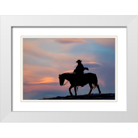 USA- Shell- Wyoming. Hideout Ranch cowgirl silhouetted on horseback at sunset.  White Modern Wood Framed Art Print with Double Matting by Gulin, Darrell