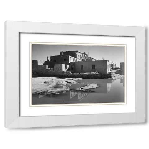 Adobe House with Water in Foreground - Acoma Pueblo, New Mexico - National Parks and Monuments, ca.  White Modern Wood Framed Art Print with Double Matting by Adams, Ansel
