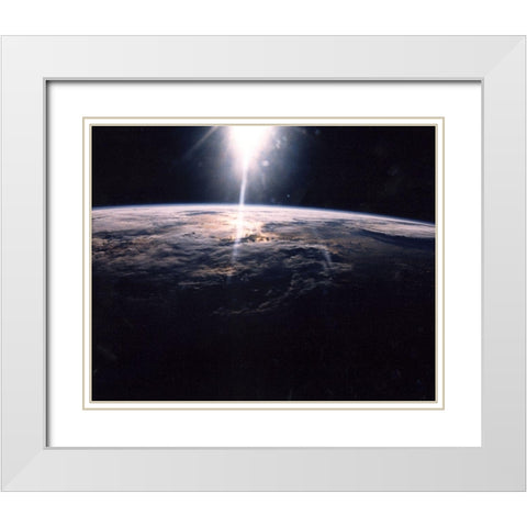 Sunlight over Earth as seen by Discovery crew White Modern Wood Framed Art Print with Double Matting by NASA