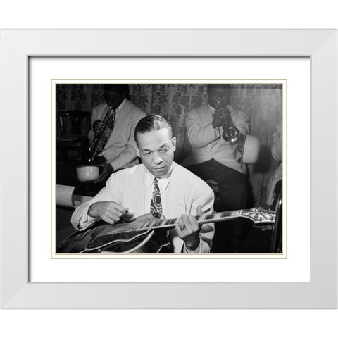 Fred Guy playing guitar at the Aquarium-New York 1946 White Modern Wood Framed Art Print with Double Matting by Gottlieb, William