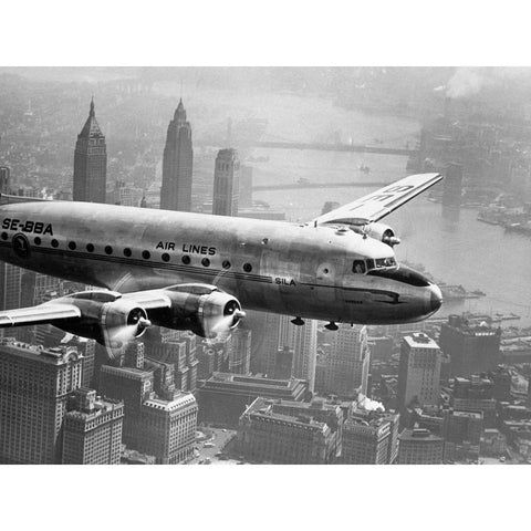 Aircraft Flying over City 1946 White Modern Wood Framed Art Print by Anonymous