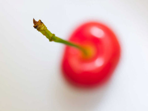 Close-up of cherry, studio shot Black Ornate Wood Framed Art Print with Double Matting by Frank, Assaf