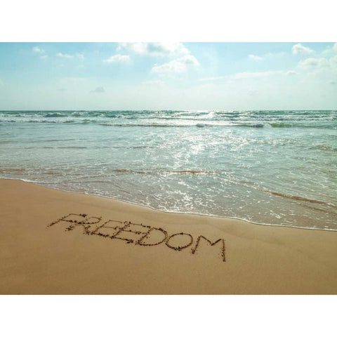 Word Freedom written in sand on the beach Black Modern Wood Framed Art Print by Frank, Assaf