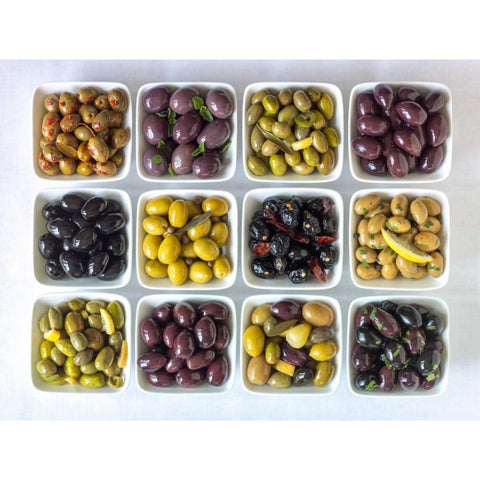 Varieties of Olives in bowls on white background Gold Ornate Wood Framed Art Print with Double Matting by Frank, Assaf