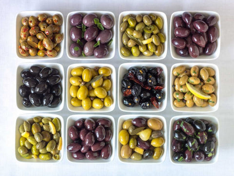 Varieties of Olives in bowls on white background White Modern Wood Framed Art Print with Double Matting by Frank, Assaf