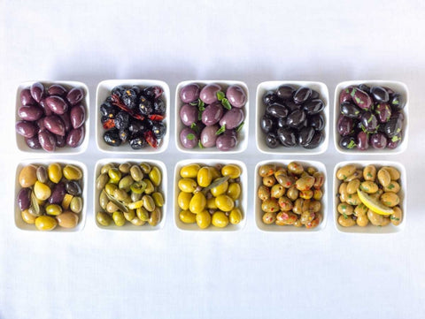 Varieties of Olives in bowls on white background White Modern Wood Framed Art Print with Double Matting by Frank, Assaf