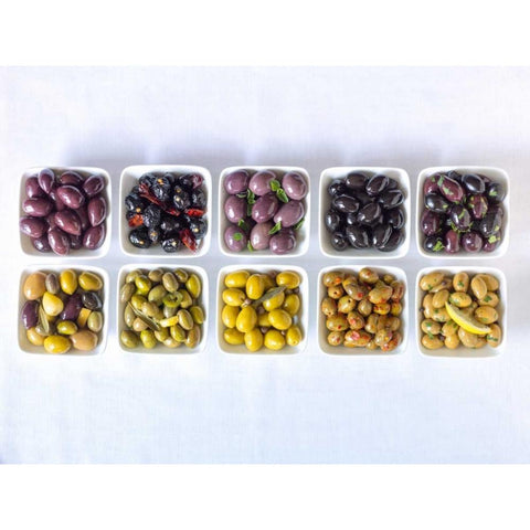 Varieties of Olives in bowls on white background Gold Ornate Wood Framed Art Print with Double Matting by Frank, Assaf